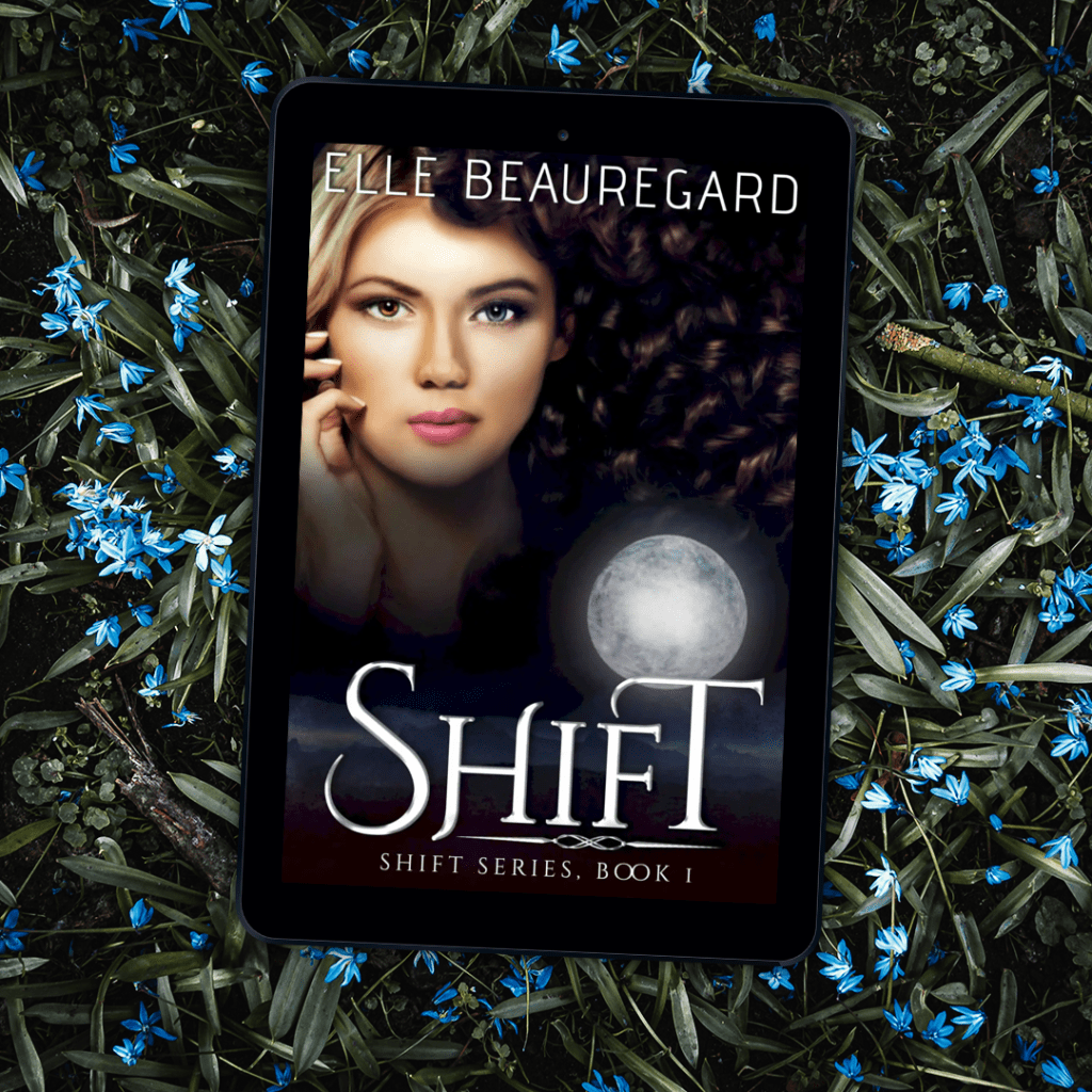 The cover of SHIFT (Shift Series 1) laying on a bed of rosemary and blue flowers.